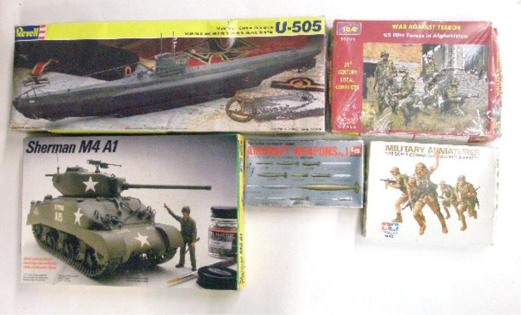 1980's & 1990's Military Related Model Kits: Five 1980's and 1990's military related model kits with boxes, Revell Inc. W.W. II German Submarine U-505, Testor Corporation Sherman M4A1 tank (1/35 scale), LS Accessory Series Aircraft Weapons No. 1