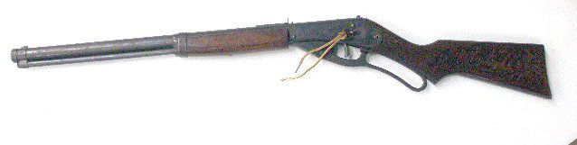 1940's Daisy Red Ryder Toy BB Rifle: 1940's Daisy Mfg. Co. No. 111 model 40 Red Ryder carbine toy BB rifle. CONDITION: Areas with wear, name inscribed on metal plate.
