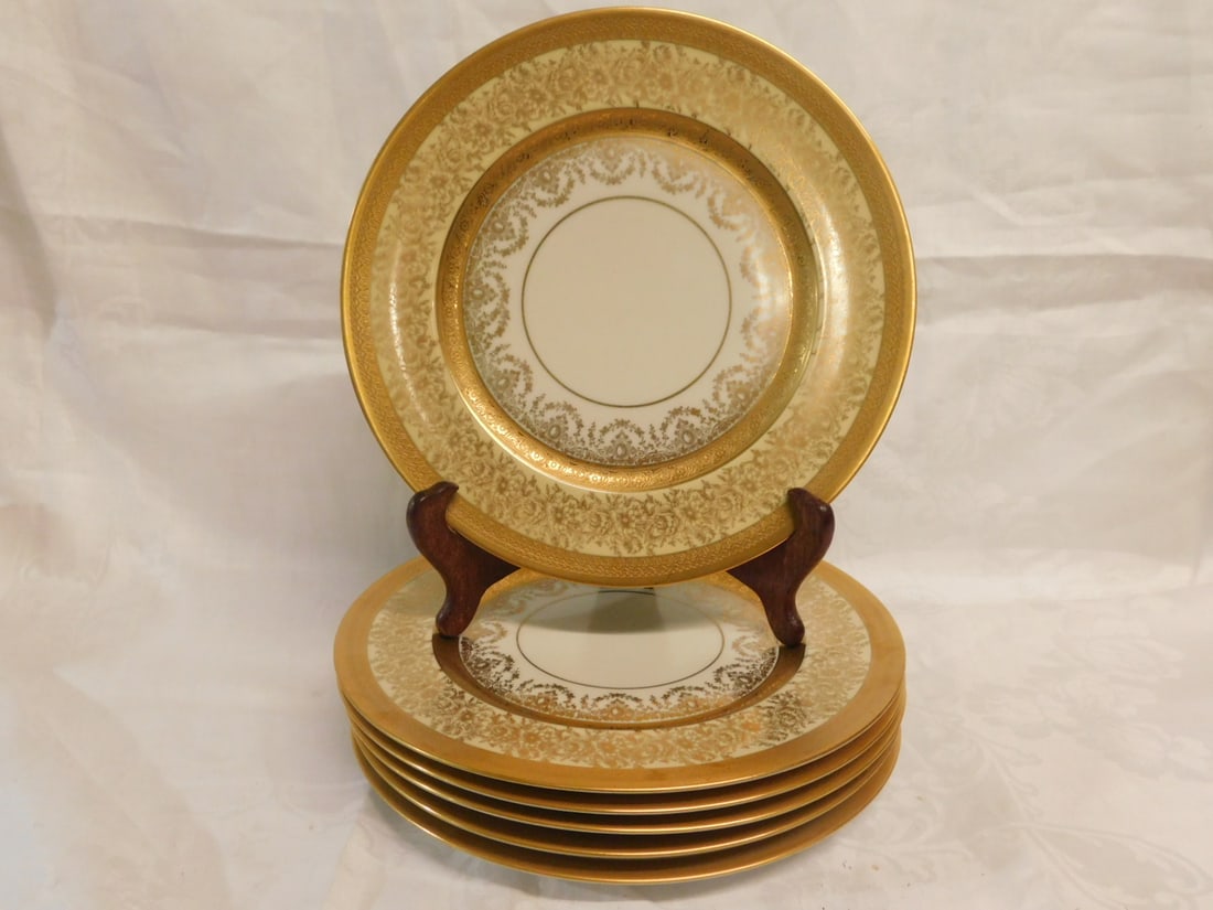 6 Bavarian Service Plates: Six Bavarian Service Plates, Heinrich & Co., 24k gold floral and scroll stenciling on porcelain, 10 7/8"d, mid 20th C. CONDITION: Very fine.