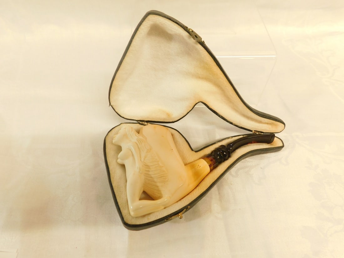 Meerschaum Female Nude Block Pipe: Meerschaum Female Nude Block Pipe, full figure, hand carved on front of long bowl, 3" bowl, 3 1/4" figure, stars and lines on bowl and shank, with amber curved stem, 6 3/8", in fitted leather case. CO