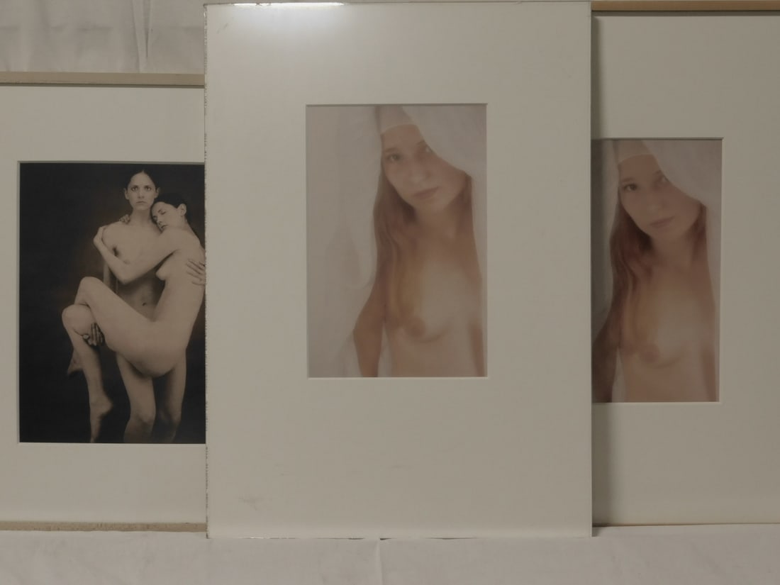 3 Female Nude Photographs: Three Female Nude Photographs, unsigned, all matted, two in wood frames, 21st C, largest 26" x 22". CONDITION: Very fine. Not examined out of frames.
