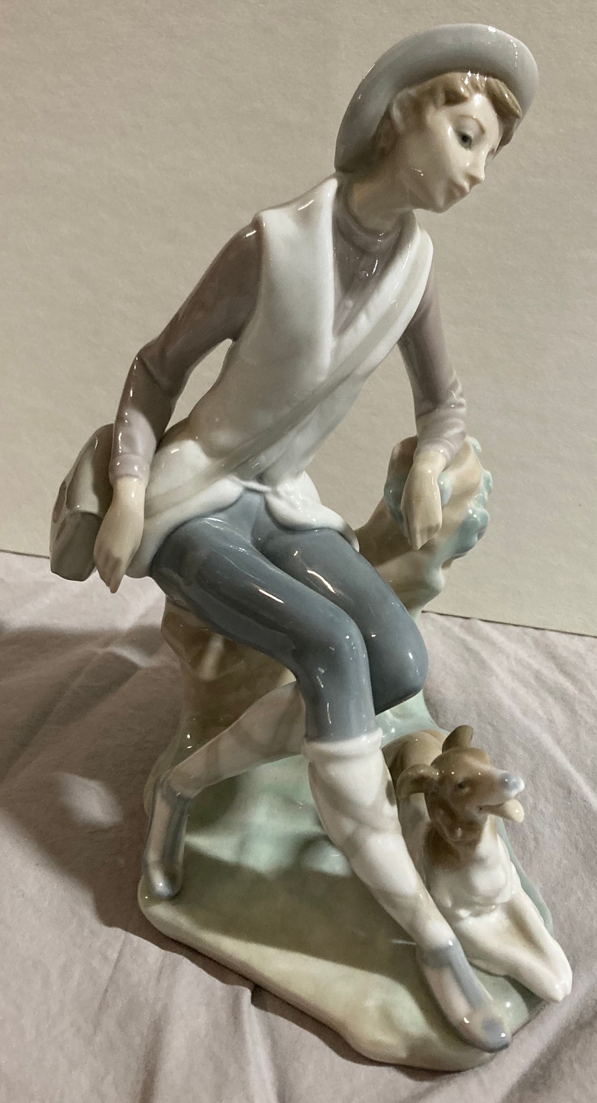 Lladro Porcelain Figure: Lladro Porcelain Figure, # 4659, Shepherd Boy (boy with dog), 7 3/4" h., no box. Condition: very good, no chips, cracks or crazing