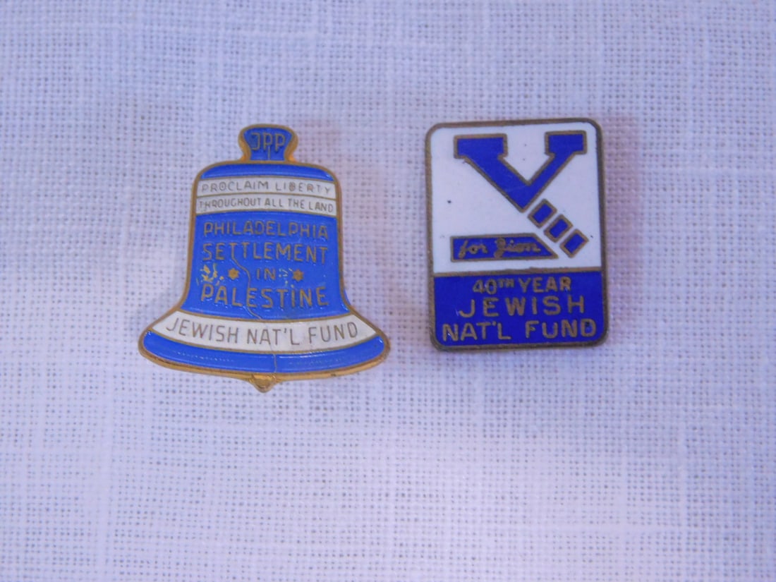 1948 Jewish National Fund Pins: 1948 Jewish National Fund Pins, enameled brass,includes: rare "Philadelphia Settlement in Palestine in Liberty Bell form; and a "For Zion" 40th year. [218] CONDITION: Very good, slight enamel loss on 
