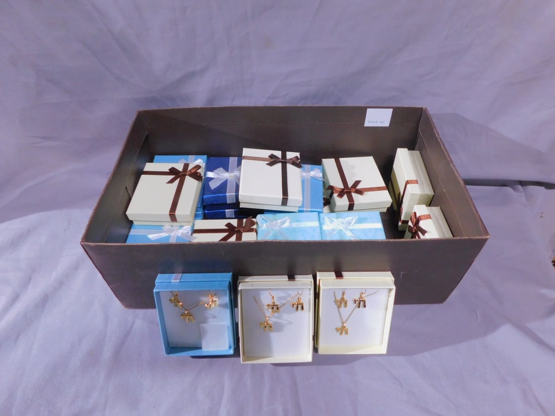 23 Chai Necklace / Earring Sets: Twenty-three Chai Necklace / Earring Sets, gold plated, pierced earrings, vintage new in boxes, circa 1970-80s. [98] CONDITION: Vintage, new in boxes.