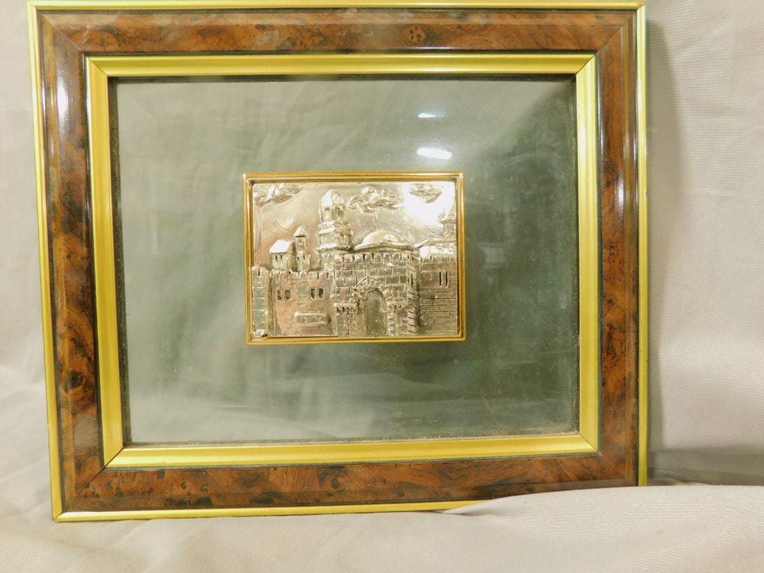 Saad Sterling Plaque: Saad Sterling Plaque, sterling silver embossed plaque of the Temple in Jerusalem with gold washed border; set in beveled glass with a gilt and burl wood frame, 20th C, 8 1/2" x 10". [265] CONDITION: S