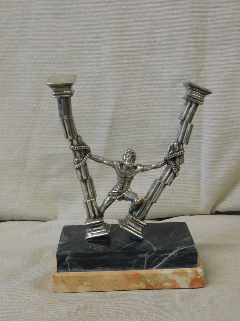 Yaacov Heller Sterling Sculpture: Yaacov Heller Sterling Sculpture, Israeli artist b. 1941;titled "Samson's Death", depicts a sterling silver sculpture of a chained Samson pulling down two large columns, black on rouge marble bases, 7