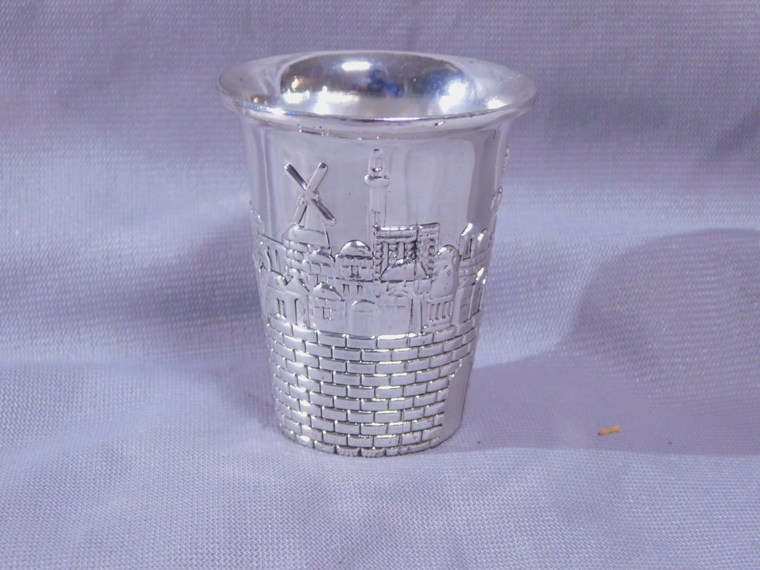 Kiddush Cup: Kiddush Cup, "925" sterling silver, base marked 'RA", cast Jerusalem landscape, 2"h. 1.25 ozts. [20] CONDITION: Excellent.