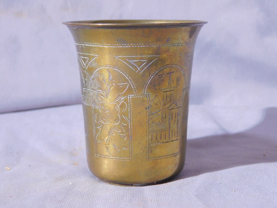 Russian Silver Kiddush Cup: Russian Silver Kiddush Cup, 84 silver purity, 1888 and other touch marks, brass plated over silver, etched panels of village scenes and flowers, 2 5/8"h, 1.6 ozts. [163] CONDITION: Very good, test mar