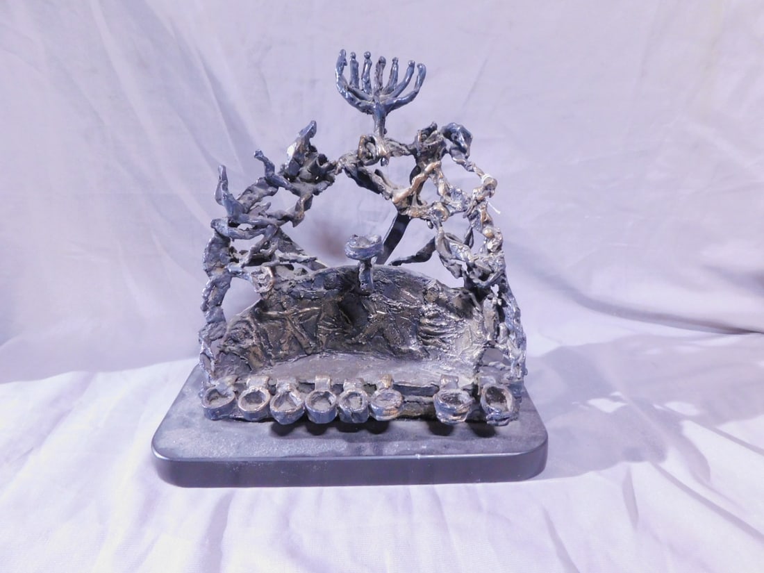 Bronze Brutalist Menorah: Bronze Brutalist Menorah, illegibly signed, attributed to Hana Gerber American / Israeli (1910 - 1990), cast and hot worked bronze in abstract form, archway to Heaven with Sabbath candelabra crest; ba