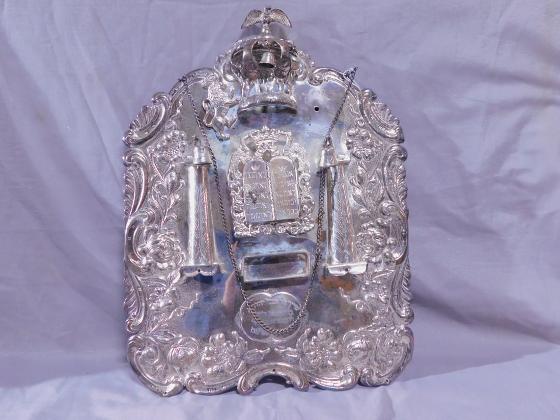 Torah Breastplate: Torah Breastplate, marked sterling silver, floral repousse and hand chaised, one Lion of Judah holds a bird crested crown with two bells over an ark with tablets of the laws door opening to a mini Tor