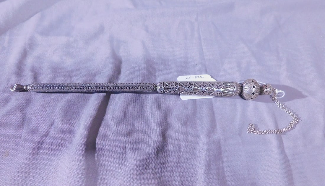 Torah Pointer (Yad): Torah Pointer (Yad), marked "925", sterling silver, filigree knob tops and handle, four sided diamond, rosette and rope cast shaft, chain, 10 1/2"l, 2.1 ozts. [57] CONDITION: Very fine, bent pointer f
