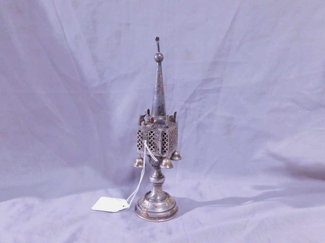 Sterling Spice Tower (Besamim): Sterling Spice Tower (Besamim), marked sterling silver, Traditional form square pierced floral and geometric body with four flags and four bells, 8 1/4"h, approx. 2.8 ozts. [67] CONDITION: Tarnished, 