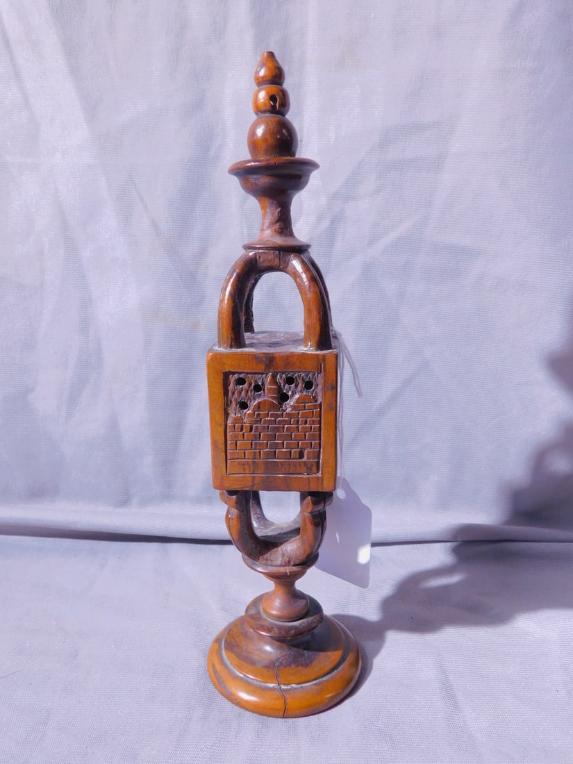 Antique Olive Wood Spice Tower: Antique Olive Wood Spice Tower, a cube form spice box with relief carvings of the Temple is supported from top and bottom by shaped arches, turned finial and pedestal base, 8 7/8"h, late 19th C. [228]