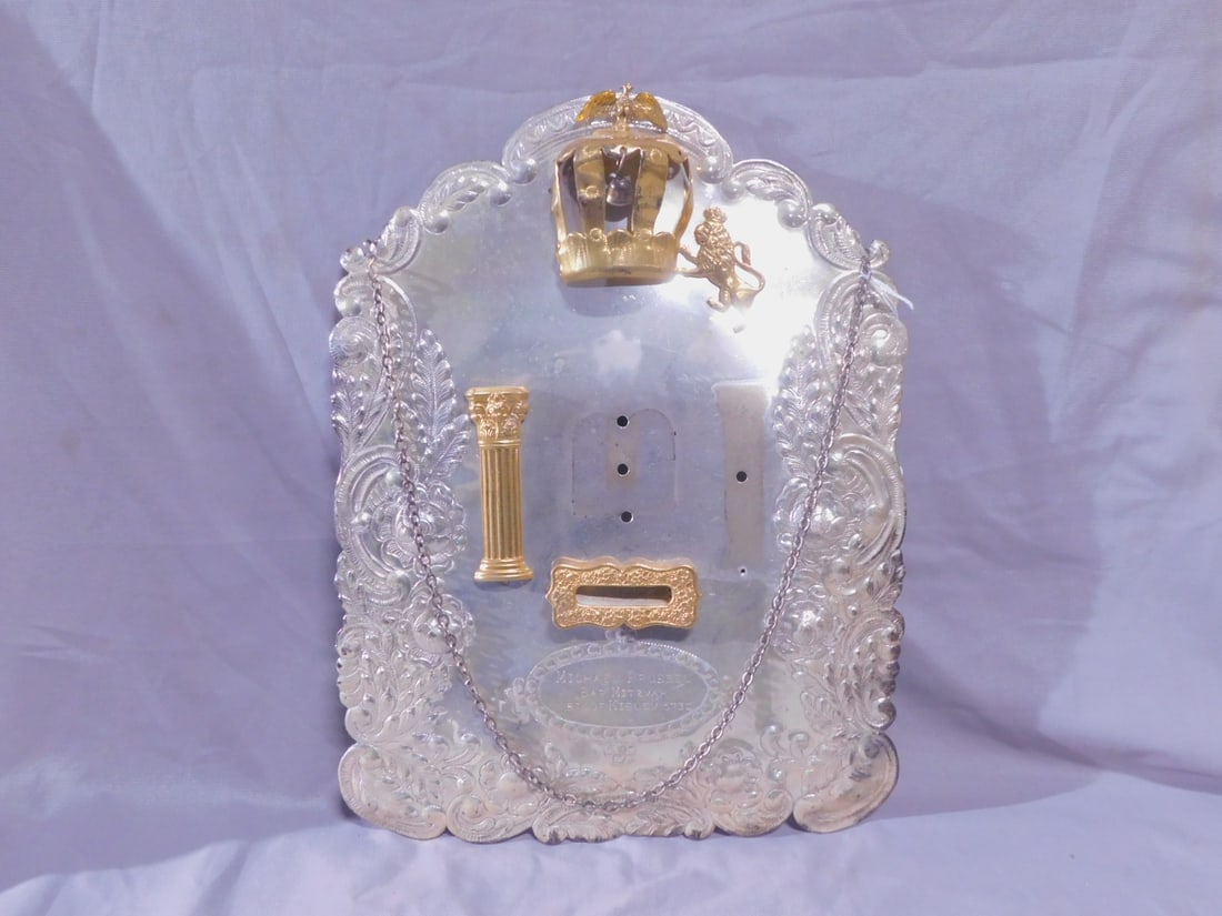 Torah Breastplate: Torah Breastplate, unmarked sterling silver (tested) with gold wash, floral embossed and hand chaised; applied bird crested crown with one bell and one attached Lion of Judah, one Temple column and de