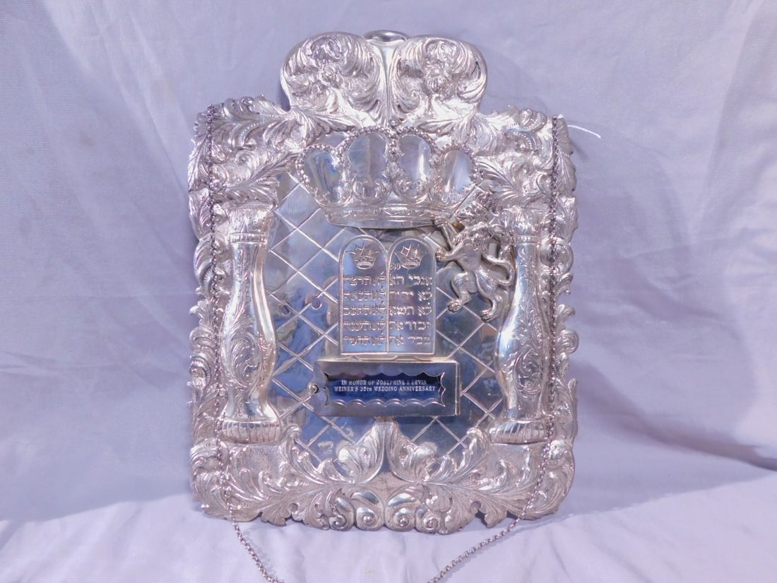 Torah Breastplate: Torah Breastplate, Continental silver touch and maker's marks, acanthus scroll repousse and hand chaised, applied crown held by one Lion of Judah, over a tablet of the Laws and flanked by two embossed