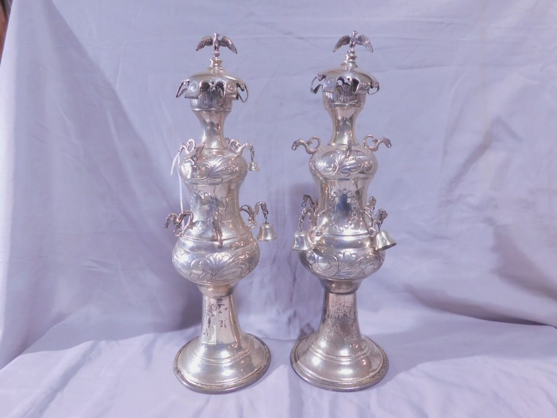Pr Torah Rimonim (Finials): Pair Torah Rimonim (Finials), marked sterling silver, acanthus scroll hand chaised, bird crested crown tops over double gourd bodies with bird form arms having pendant bells, Mogen David and oval cart