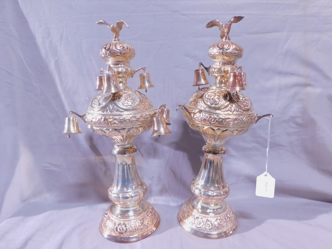 Pair Torah Rimonim (finials): Pair Torah Rimonim (finials), marked sterling silver (tested), floral and foliate overall repousse and chaised, bird crests on modified crowns and melon bodies, all with arms for suspending bells, flu