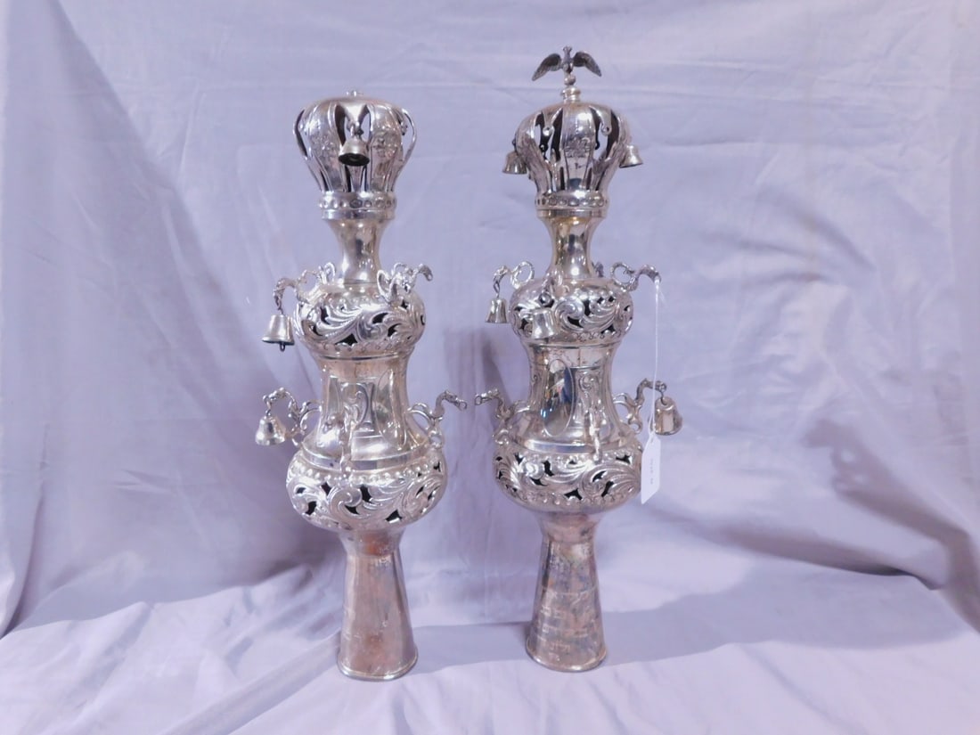 Pr Torah Rimonim (finials): Pair Torah Rimonim (finials), marked sterling silver, hand chaised, engraved and open work, acanthus scroll and rosettes; bird crested crowns with bells, over urn form bodies with dragon form arms and