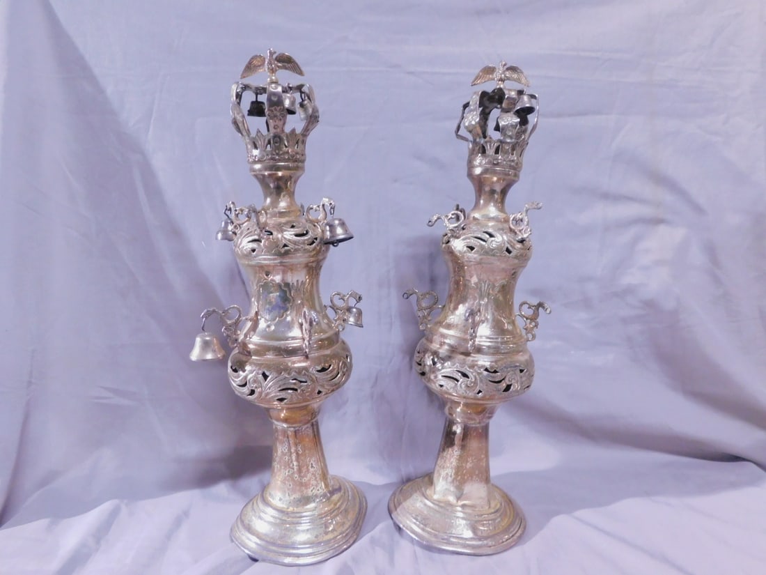 Pr Torah Rimonim (finials): Pair Torah Rimonim (finials), unmarked sterling silver (tested), bird crested crowns with bells over scroll chaised and pierced urn form bodies with bird form arms and suspended bells, Hebrew engraved