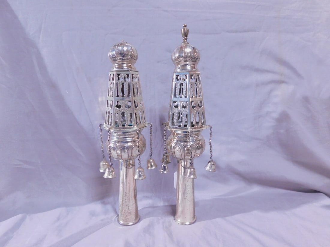 Pr Torah Rimonim (finials): Pair Torah Rimonim (finials), marked sterling silver, finial on a domed crest over twelve open work and chaised panels with chain suspended bells, 13 1/2"h, 26.60 ozts TW [42] CONDITION: Very good, mi