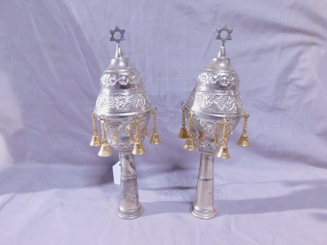 Pr Torah Rimonim (finials): Pair Torah Rimonim (finials), silver plate and gold wash, embossed grape and rosette design, Mogan David crests, gold washed pendant bells, 10 1/2"h. [27] CONDITION: Very good, light tarnish.