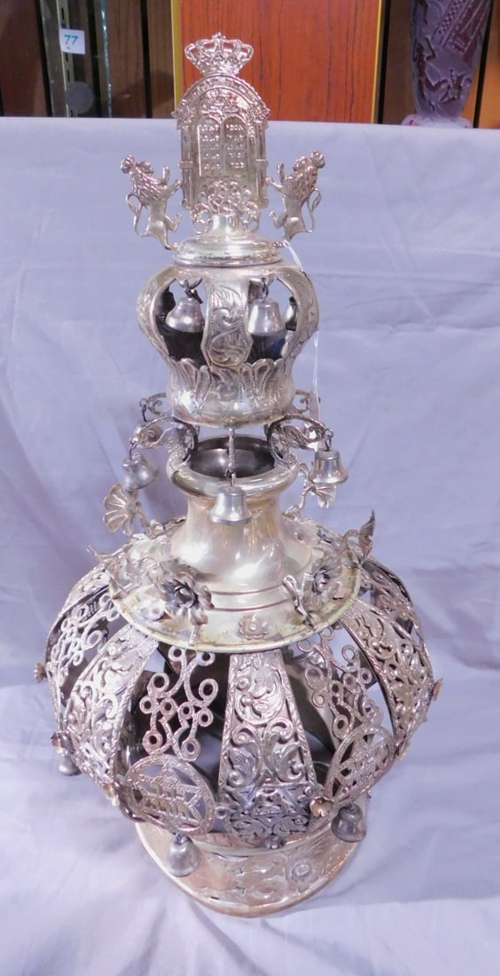 Torah Crown: Torah Crown, marked sterling silver, a pair of Lions of Judah hold a crowned tablet of Laws on a small scroll chaised crown with bells upon a larger crown with raised flowers, cast openwork panels of