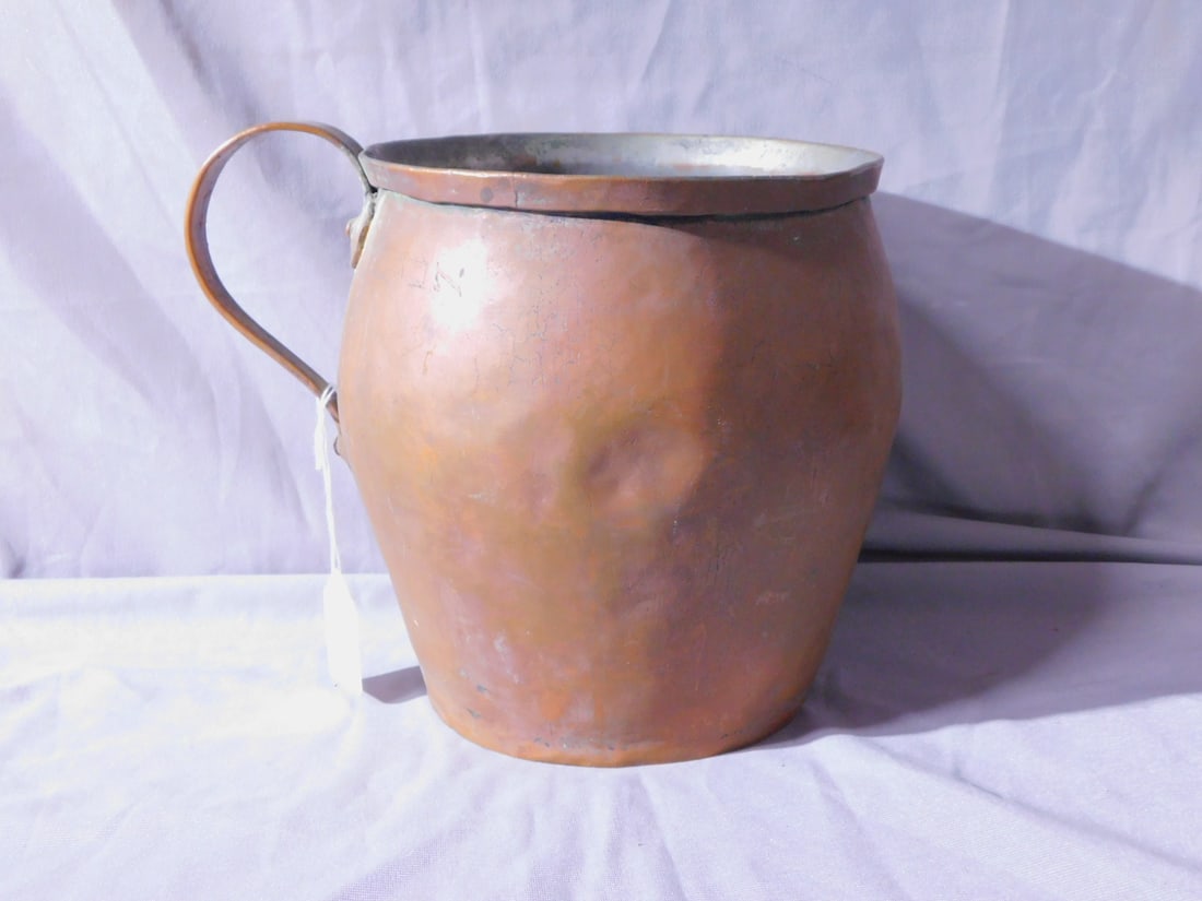 Antique Copper Water Jug: Antique Copper Water Jug, heavy shaped copper with worn tin plate lining, loop handle, engraved in Hebrew, 8"h, 7"d, 19th C. [72] CONDITION: Tarnished, dents and scratches.