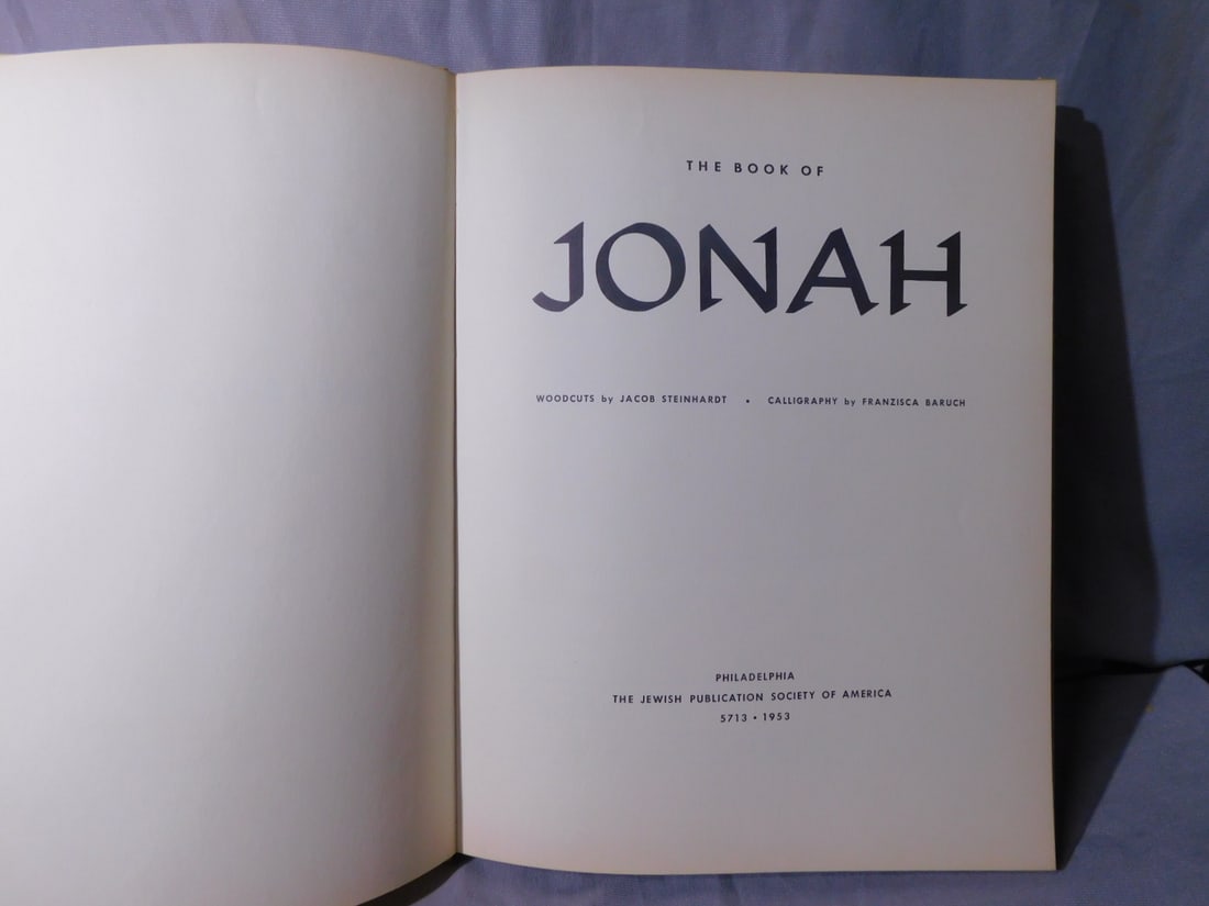 The Book of Jonah: The Book of Jonah, Jacob Steinhardt wood cut illustrator, Franzisca Baruch calligraphy, Jewish Publication Society of America 1953, in Hebrew and English, 13 1/2" x 10 1/2". [190] CONDITION: Very fine