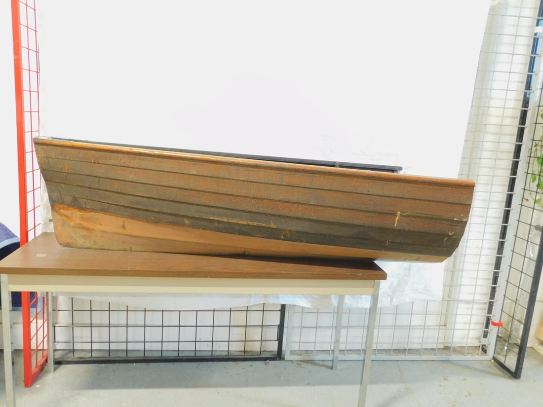 Stern of Small Boat: Stern of Small Boat, fragment, 65 1/2" l, striped to skeleton (no seats), stands on open end. Condition: some wear from use