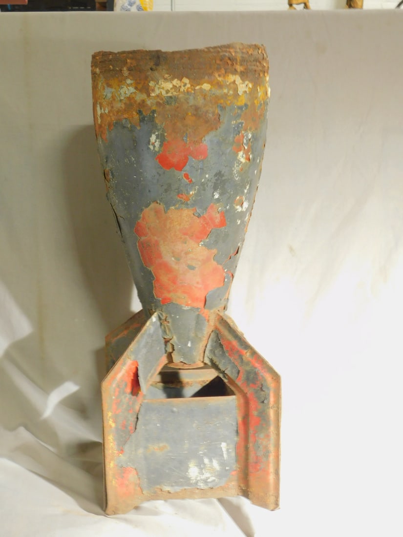 Large Bomb Remnant: Large Bomb Remnant , painted metal, possibly WW II or earlier, 21 1/4". CONDITION: Poor, rust, pealing paint, dents, as is.