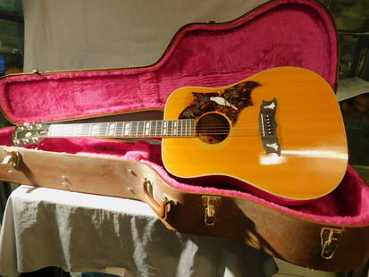 Gibson Dove Guitar: Gibson Dove Guitar, Dove custom acoustic six string guitar, natural spruce top; red finish sides and back, mother of pearl inlays, Dreadnought body type; Grover tuners; "Gibson" fitted hard case, circ