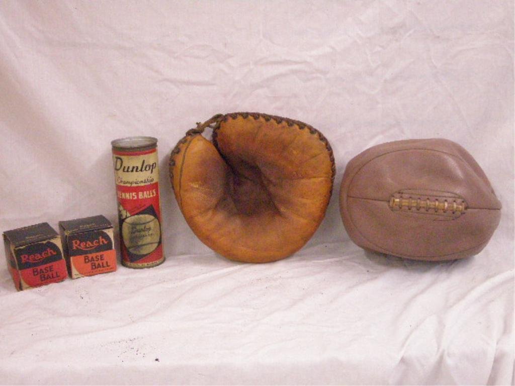 Vintage Sporting Goods: Tray lot of vintage sporting goods, includes: two Reach Official League Baseballs, Bill Dickey model belt back catcher's mitt, leather basketball & unopened can of Dunlop Championship Tennis Balls. CO