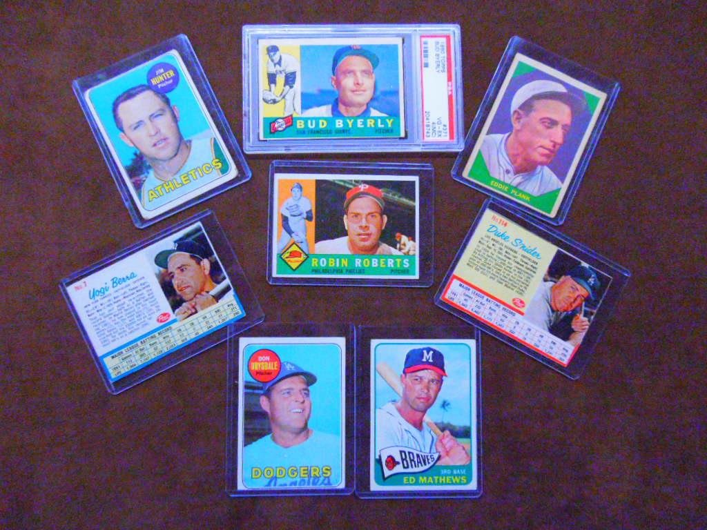 1960's Baseball Cards: Lot of seven assorted 1960's Hall of Famer Baseball cards, includes: 1960 Topps #264 Robin Roberts, 1960 Fleer #46 Eddie Plank, 1962 Post Cereal #7 Yogi Berra & #114 Duke Snider, 1965 Topps #500 Eddie