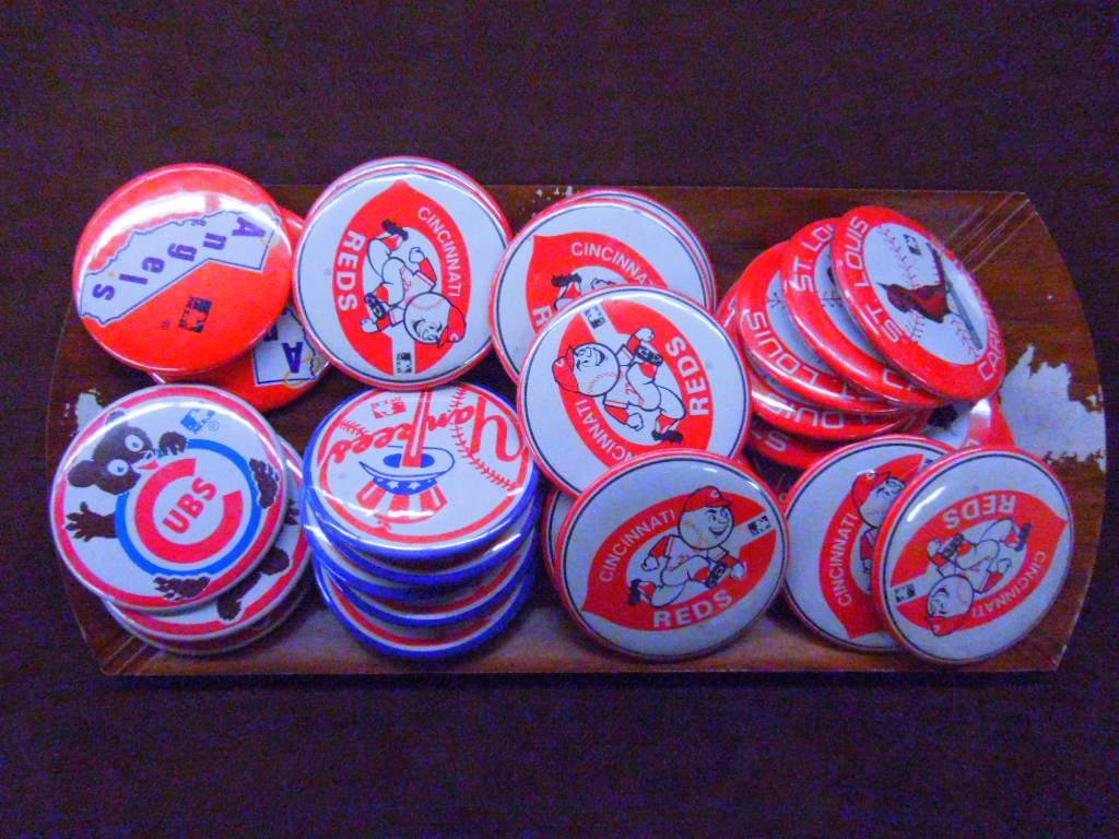 1970's Baseball Team Logo Pins: Lot of thirty two 1970's Baseball team logo large sized pins, (2) California Angels, (3) Chicago Cubs, (6) New York Yankees, (9) St. Louis Cardinals & (12) Cincinnati Reds. CONDITION: All have some fo
