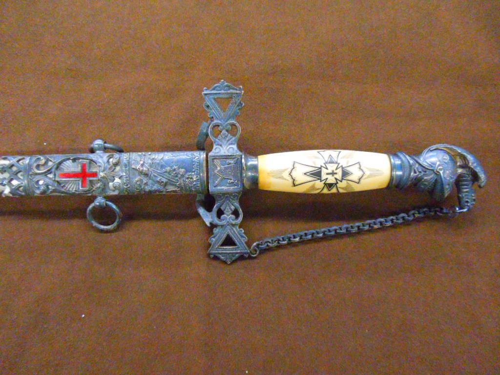 Antique Knights of Columbus Sword: Late 19th/early 20th c. Knights of Columbus sword that belonged to Newton P. Jarrett, bone handle with silver plate decorations, made by Morgan Puhl & Morris, Detroit Michigan. CONDITION: Good, shows 