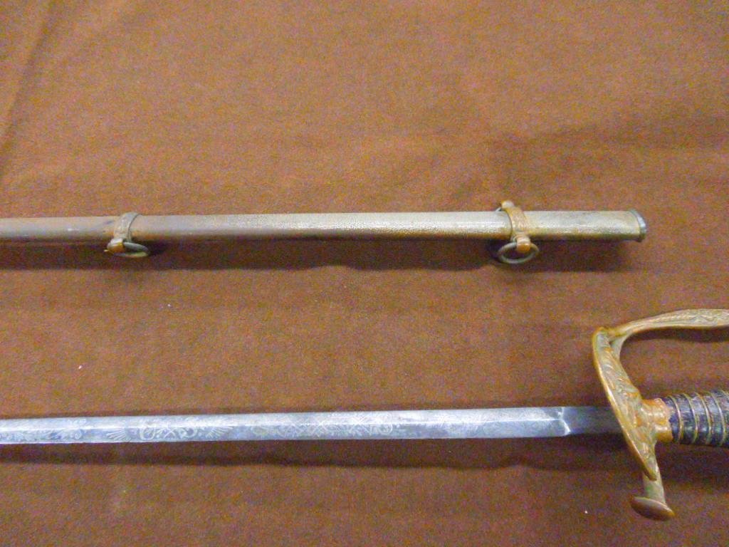 Civil War Staff and Field Officers Sword: Civil War era Model 1860 Staff and Field Officer's sword made by M.C. Lilley Co. Columbus Ohio., blade is 30" in length, brass knuckle bow & pommel, handle is wrapped in leather with brass wire, metal