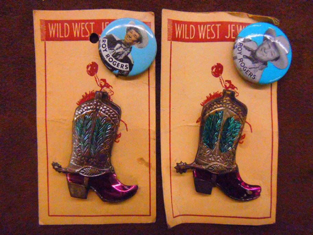 1950's Roy Rogers Pins: Two 1950's Roy Rogers Wild West jewelry photo and boot pins on cards. CONDITION: Both have some form of wear.