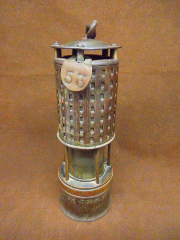 Antique Koehler Coal Miner's Lamp: Antique Koehler Permissible coal miner's safety lamp, serial #62525. CONDITION: Twist igniter works, areas with wear and or patina loss.