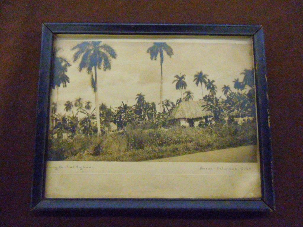 Havana Cuba Photographic Print: Early 20th c. framed 8" x 10" black & white photographic print "Along Central Highway, Havana-Montanzas, Cuba", overall size framed is 9" x 11". CONDITION: Small tear & warping at bottom right corner,