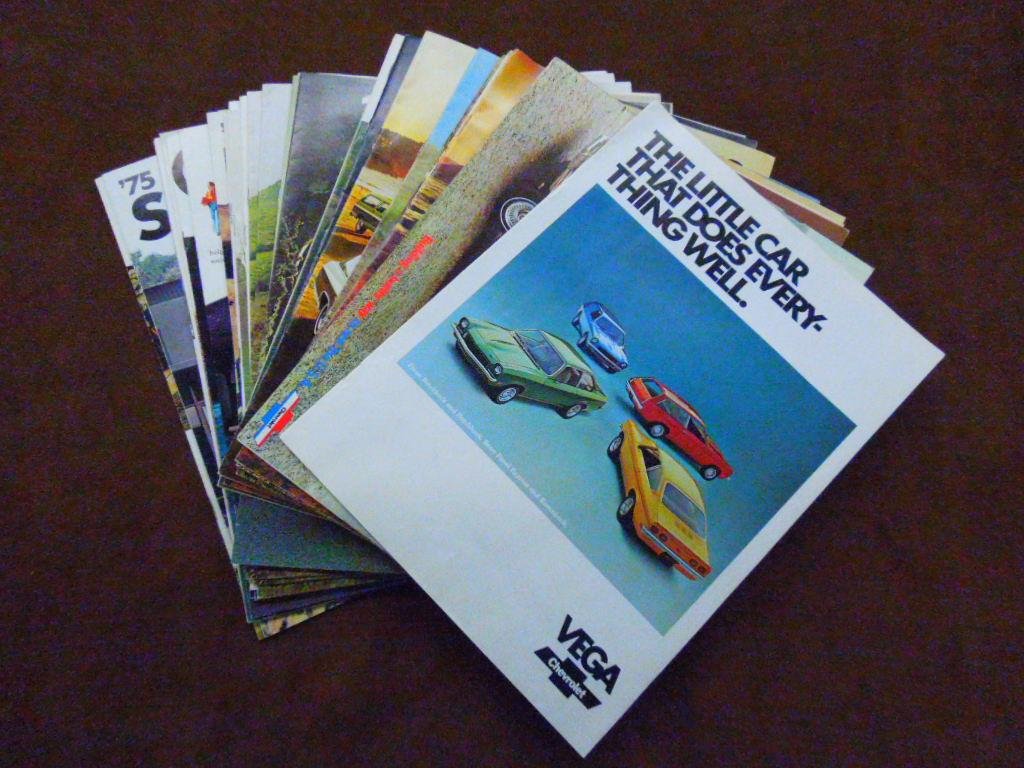 1973-1975 Chevrolet Dealership Brochures: Lot of thirty four assorted 1973-1975 Chevrolet car dealership sales brochures for Corvette, Camaro, Vega, Monte Carlo, Chevelle & other models. CONDITION: All have some form of wear.