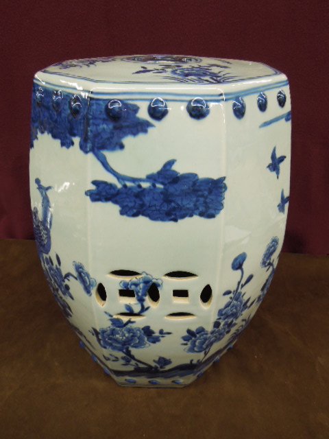 Chinese Garden Seat: Chinese garden seat, blue and white underglaze porcelain in octagon form depicting cranes in floral landscape, 20th C., diameter 12", height 17 1/4". CONDITION: No issues identified. [1]