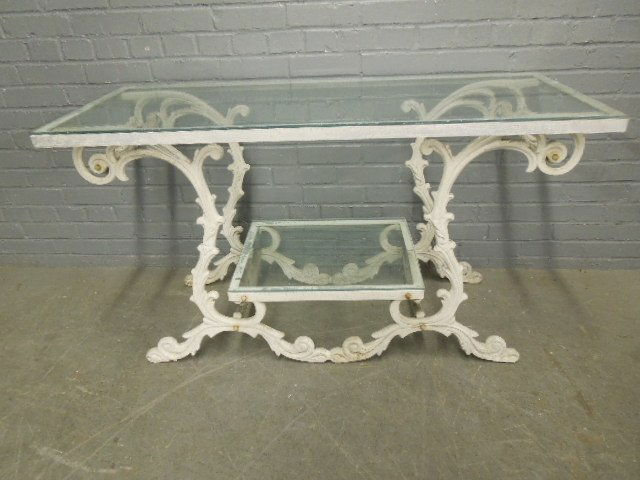 Patio Tea Cart: Patio Tea Cart, scroll work cast aluminum with white paint, glass shelves, mid 20th c. 48" x 20" x 27". CONDITION: Areas of paint pealing.