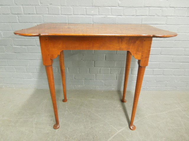 Queen Ann Style Tea Table: Queen Ann Style Tea Table, Tiger Maple, scalloped top, shaped apron club feet, bench made, mid 20th c. 33" x 22" x 27 1/4". CONDITION: No issues identified.