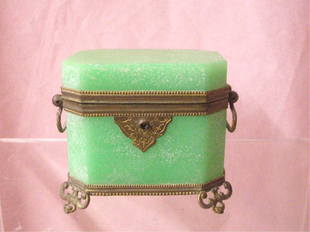 19th c. Opaline Glass Jewelry Casket: Late 19th c. French green Opaline glass 4" x 4" x 3" jewelry casket with applied brass mounts and handles. CONDITION: Glass has calcified, patina wear on brass.