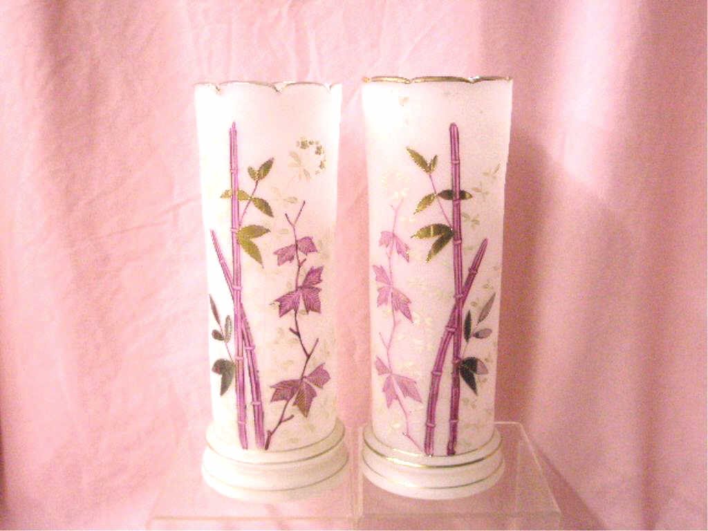 Victorian English Bristol Glass Vases: Pair of Victorian English Bristol glass 12" cylinder form vases with enameled and hand painted floral designs. CONDITION: Both with rough pontil marks and minor wear.