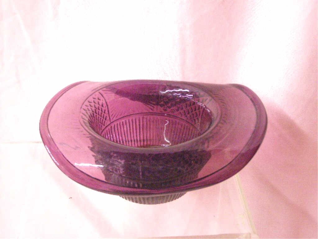 19th c. American Blown Glass Hat Bowl: 19th c. American hand blown & molded purple glass hat form 3" x 8 1/2" x 7" bowl. CONDITION: Very good with minor wear and rough pontil mark on base.
