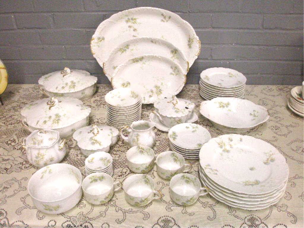 Antique Limoges Floral Design China Set: Antique Haviland & Co. Limoges porcelain fifty seven piece floral decorated china set, includes: 11", 13" & 17 1/2" serving platters, two 10" covered vegetable bowls, 10" oval vegetable bowl, six dinn