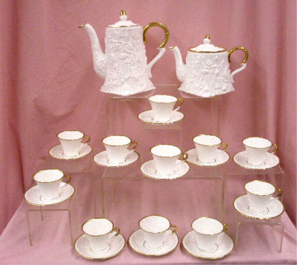 Royal Stafford Bone China Coffee/Tea Set: Royal Stafford English bone china Old English Oak-Gold pattern coffee/tea set, includes: 7 3/8" coffee pot and lid, 4" small teapot and lid and eleven demitasse cups and saucers. CONDITION: All are ve
