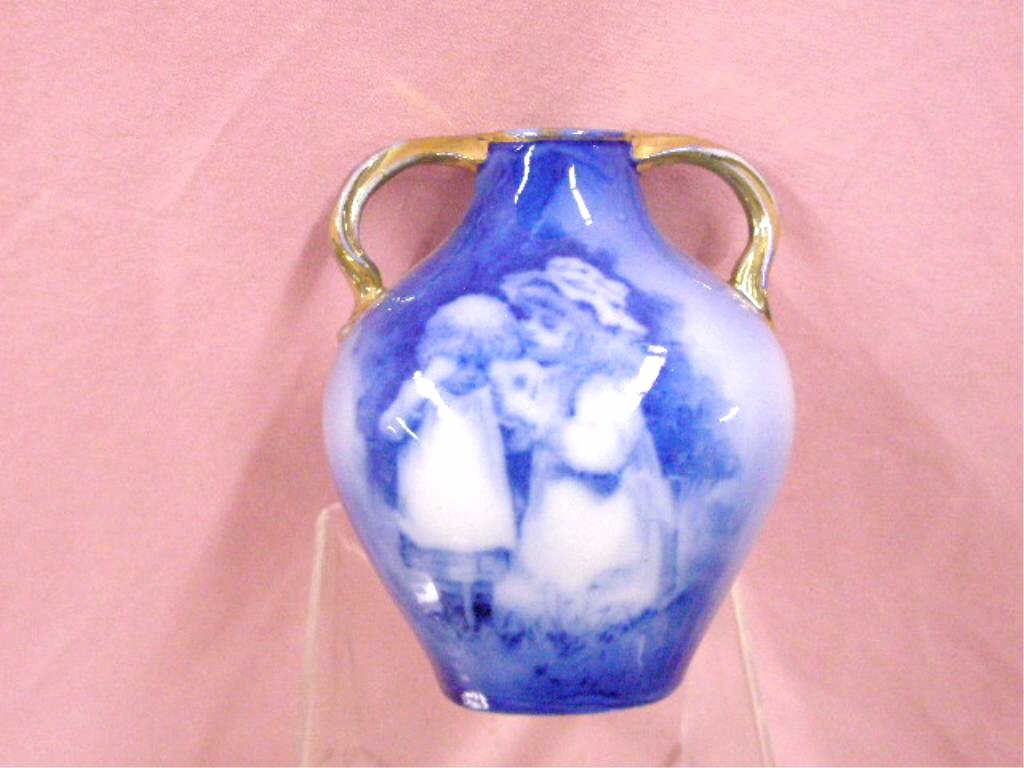 Antique Continental Porcelain Cabinet Vase: Unsigned late 19th c. Continental blue and white porcelain 3 1/2" cabinet vase, hand painted with children and landscape scene. CONDITION: Very good with minor wear and no damage.