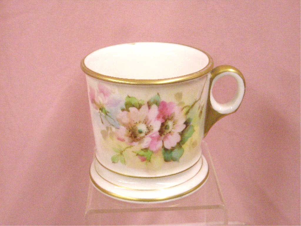 Antique Limoges Porcelain Shaving Mug: Late 19th/early 20th c. Tressemanes and Vogt Limoges porcelain 3 3/4" x 4 1/2" shaving mug with hand painted floral decoration. CONDITION: Very good with minor wear and no damage, gilt painted monogra